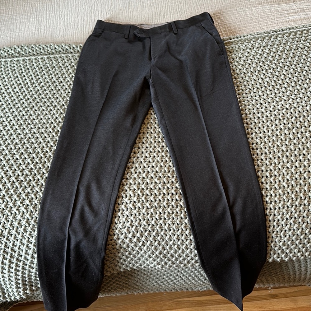 Black dress pants. 100% Italian wool. Flat front. Slim fit.